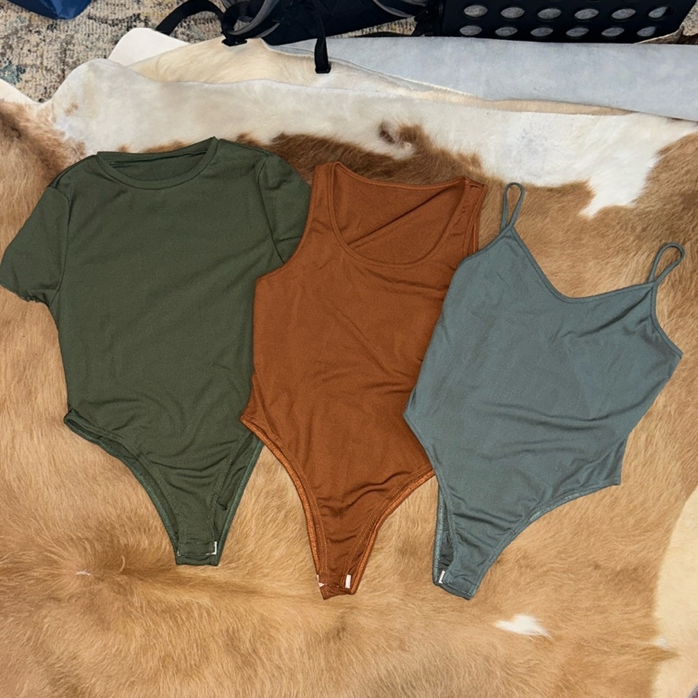 Women’s bodysuit. Never worn. Great condition